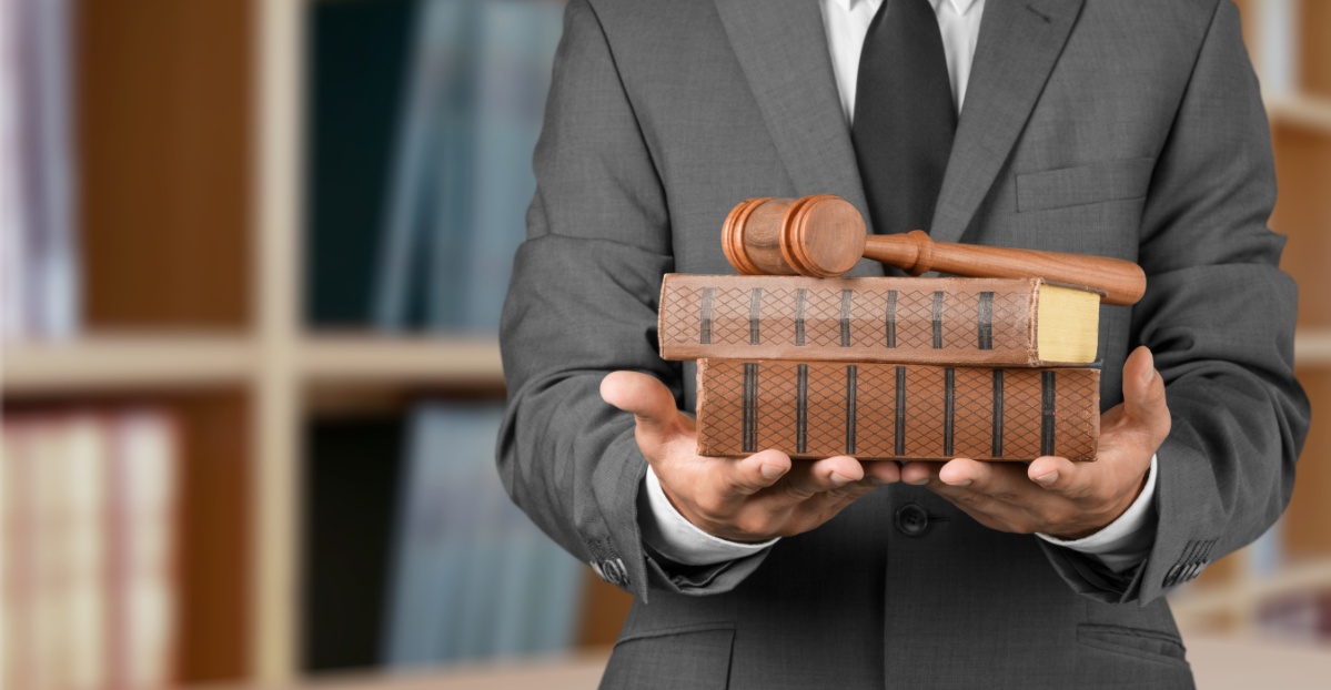 close-up-lawyer-with-gavel-judge-books